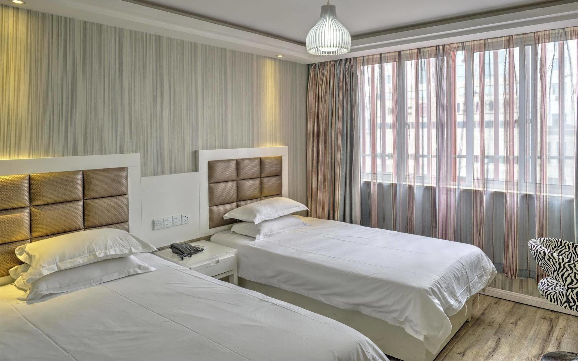 Milan Fashion Hotel Deqing Buitenkant foto