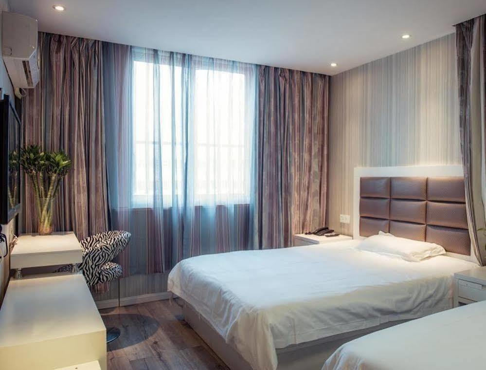 Milan Fashion Hotel Deqing Buitenkant foto
